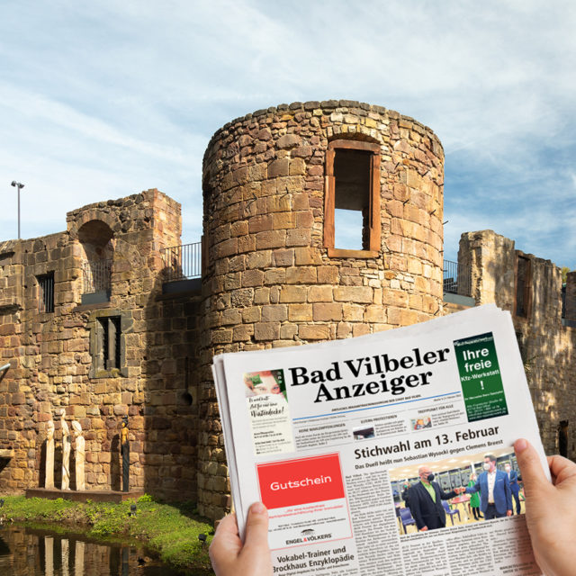 Nahaufnahme des Wochenblatts Bad Vilbeler Anzeiger vor der Wasserburg in Bad Vilbel