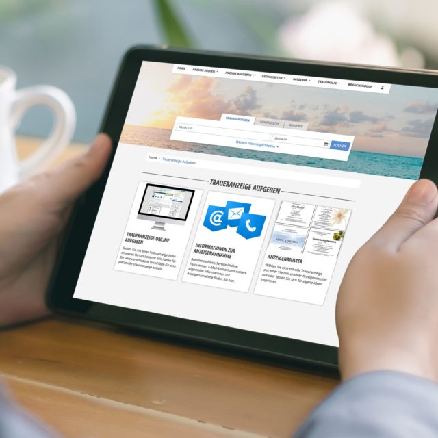 Foto: Mann scrollt auf einem Tablet und sieht sich die Website trauer-rheinmain.de